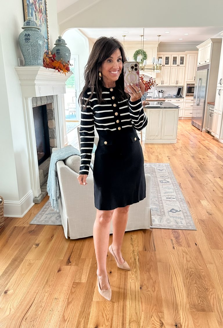 Cyndi Spivey wearing a classic black and white dress with gold buttons with high heels, Amazon fall fashion