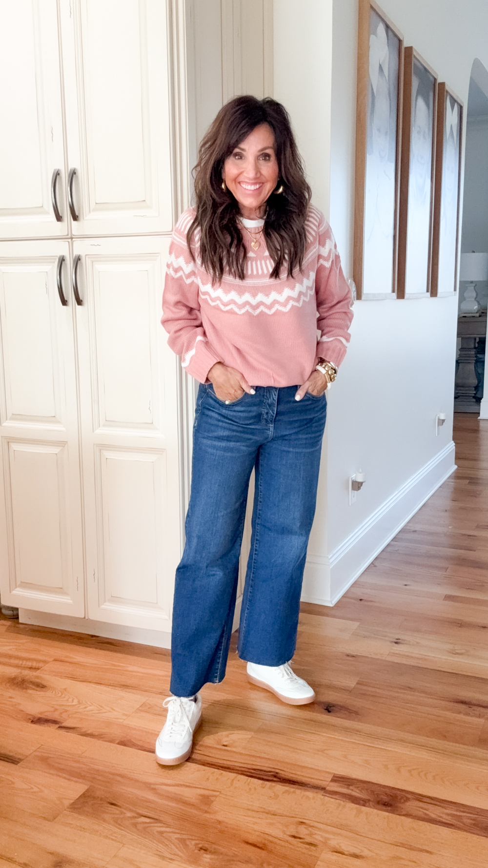 woman wearing a fall outfit fair isle sweater from amazon with jeans and sneakers