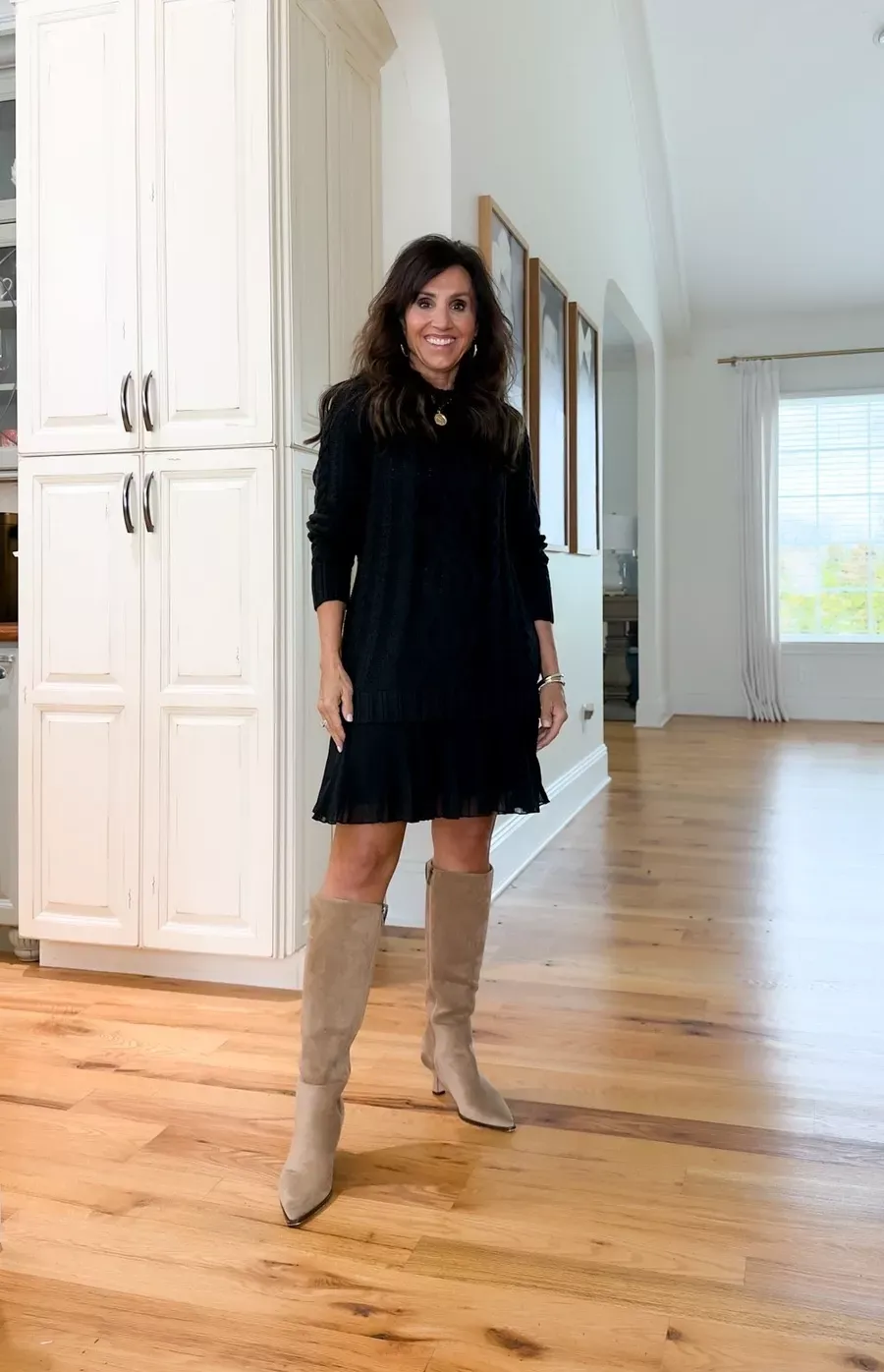 A BLACK DRESS WITH TALL BOOT OUTFIT