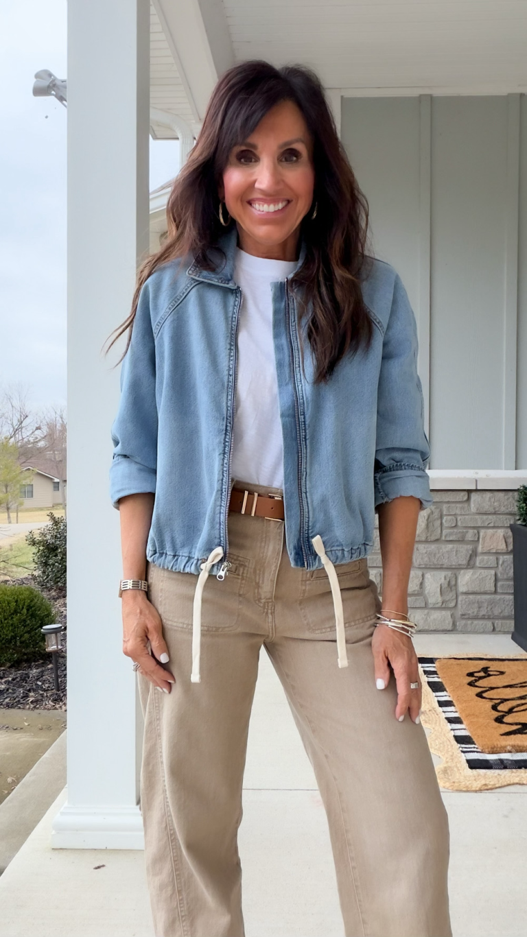 Cyndi wearing a denim jacket with a bubble hem.