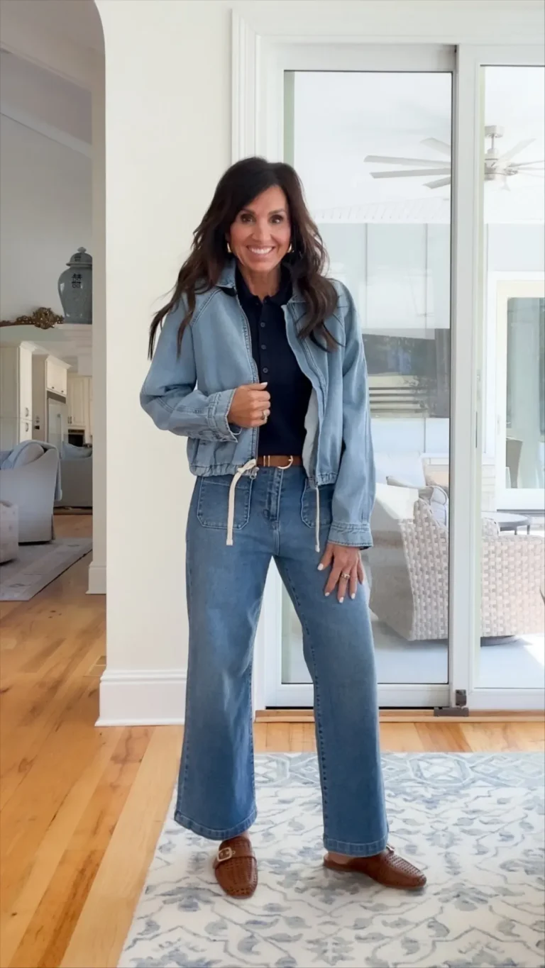 Cyndi Spivey wearing a denim bomber jacket.