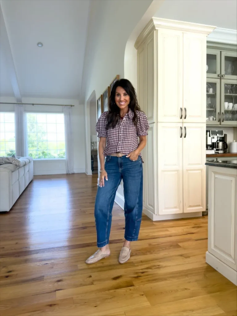 Burgundy top paired with denim jeans fall 2026